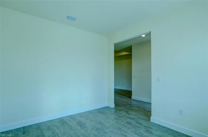Empty room featuring light hardwood / wood-style floors