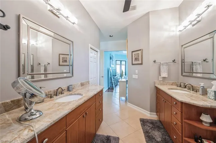 Bathroom with tile flooring and vanity