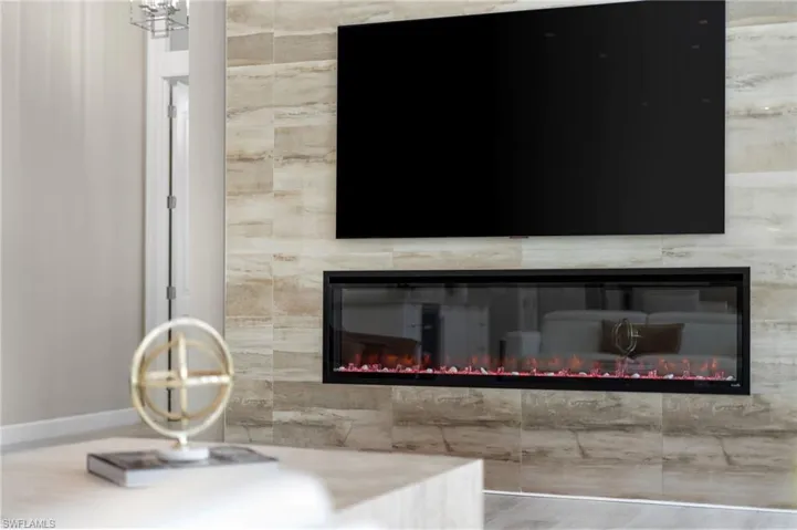 Interior details featuring a tiled fireplace