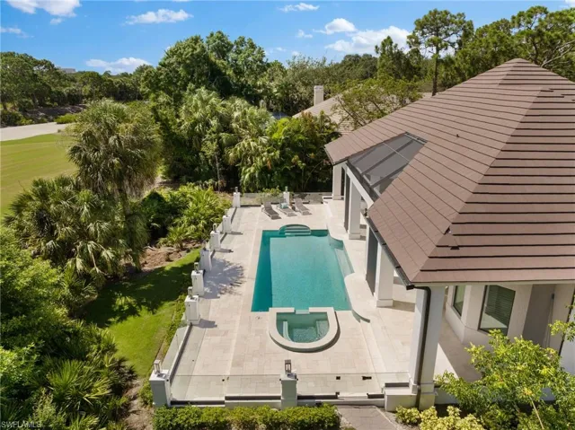 View of pool with a patio, an in ground hot tub, and a yard