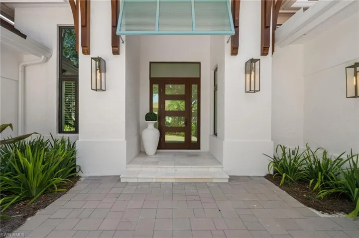 Property entrance with french doors