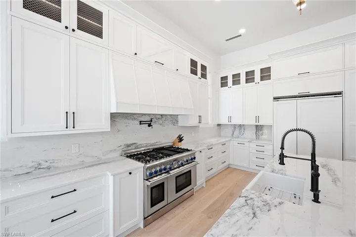 Gas stove with a pot-filler faucet
