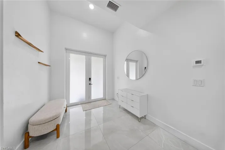 Entrance foyer with baseboards