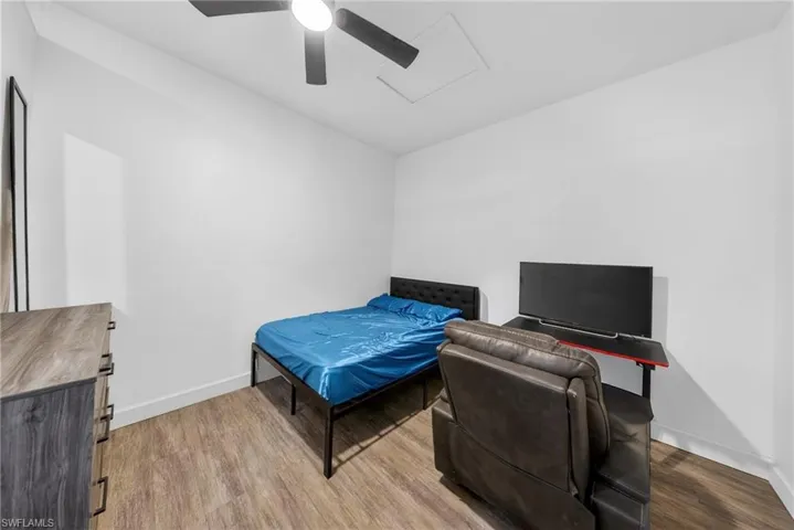 Bedroom featuring light wood-style floors and ceiling fan