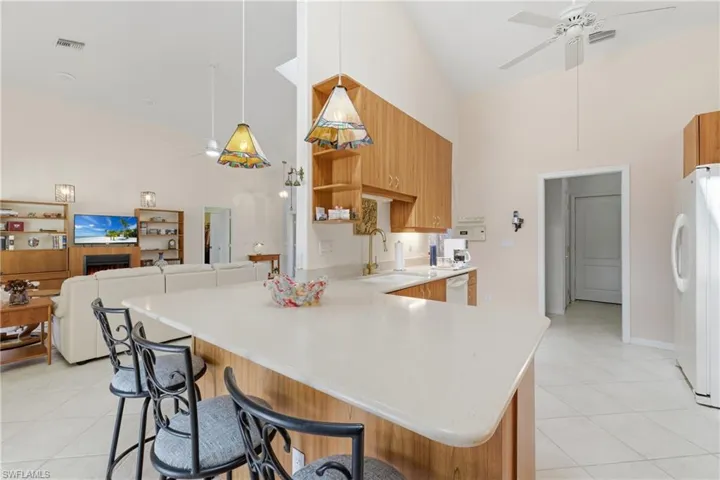 Laundry Room + Garage access dead ahead
