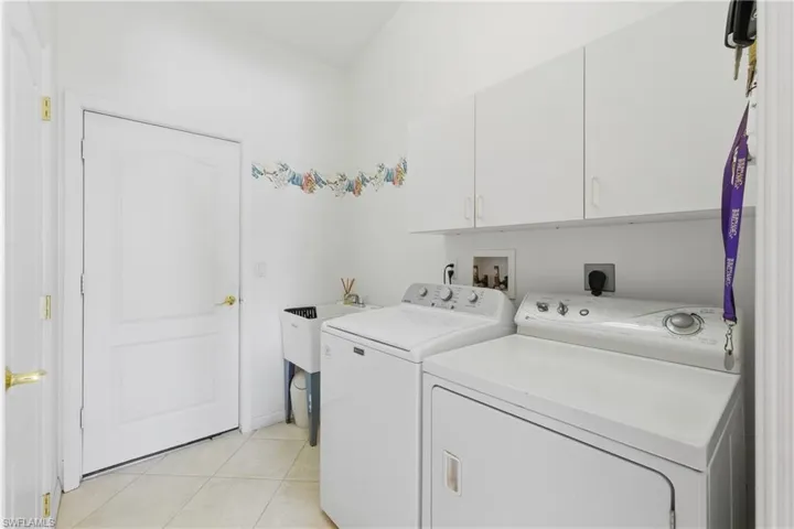 Big Laundry Room with Closets on back wall