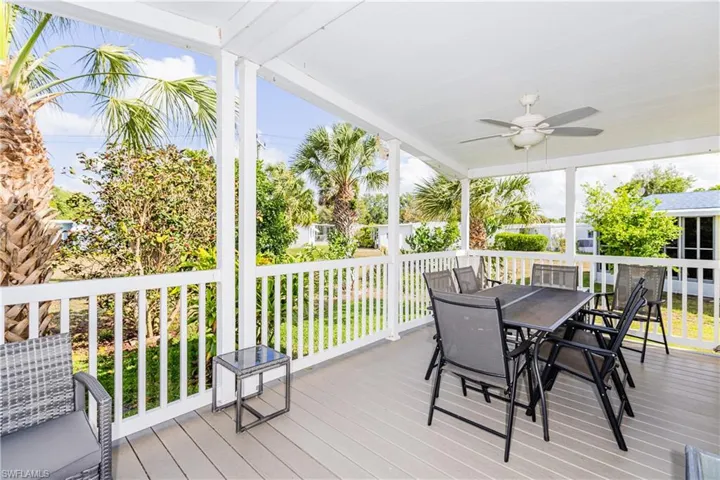 Deck featuring ceiling fan and outdoor dining area