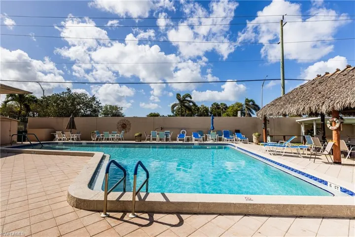 Pool featuring a patio and fence