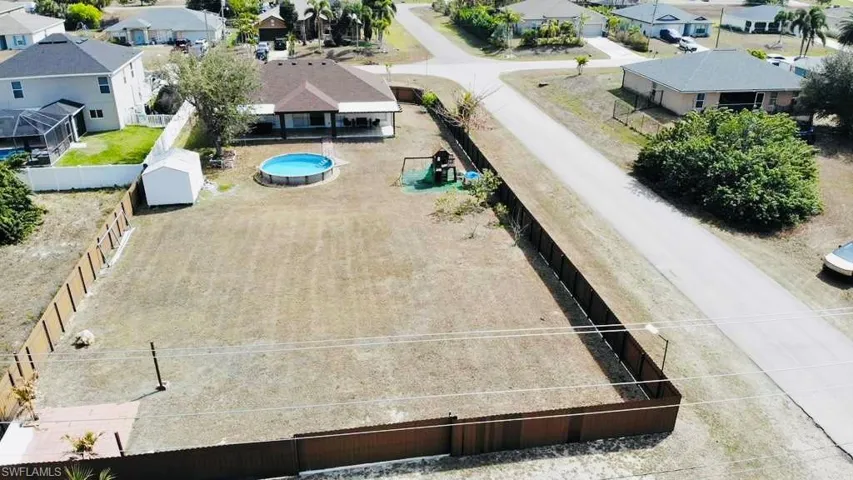 Aerial view of residential area with a pool area