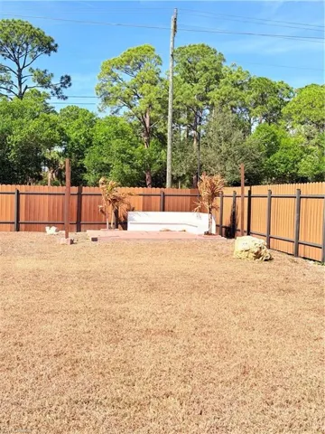 View of fenced backyard