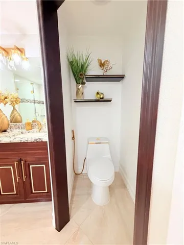 Bathroom with toilet and vanity