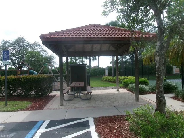 Surrounding community featuring a gazebo and fence