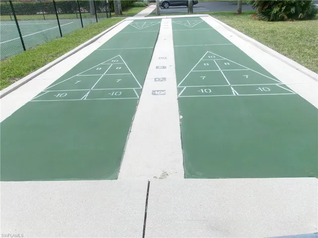 View of community featuring shuffleboard