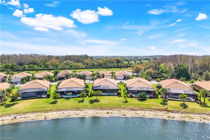 Aerial view with a residential view and a view of trees