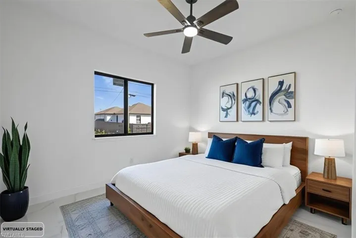 Photo Staged of 3rd Bedroom with ceiling fan.
