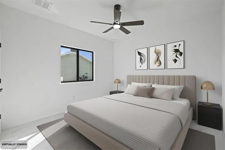 Photo Staged. 2nd Bedroom featuring ceiling fan.