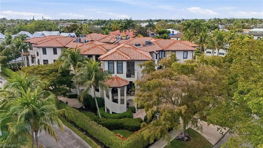 Aerial view of residential area with a tree filled landscape