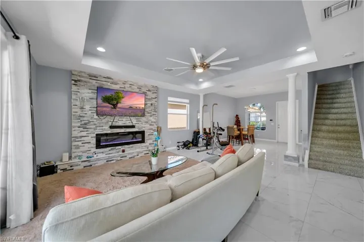 Another angle of living room, dining room and stairs