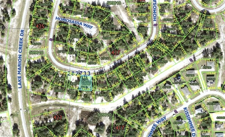 Aerial map of property and surrounding area featuring property boundaries highlighted