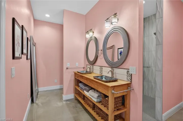 Ensuite bathroom features Step in Shower, Dual Sinks  and private commode.