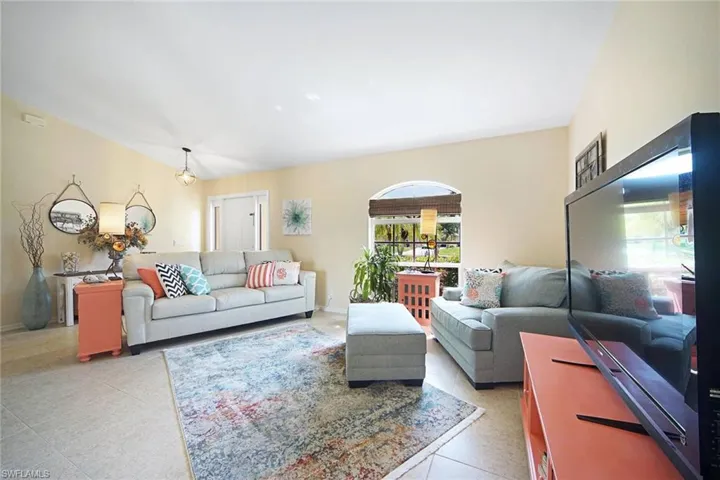 Living Room w/ flat screen tv and ample seating