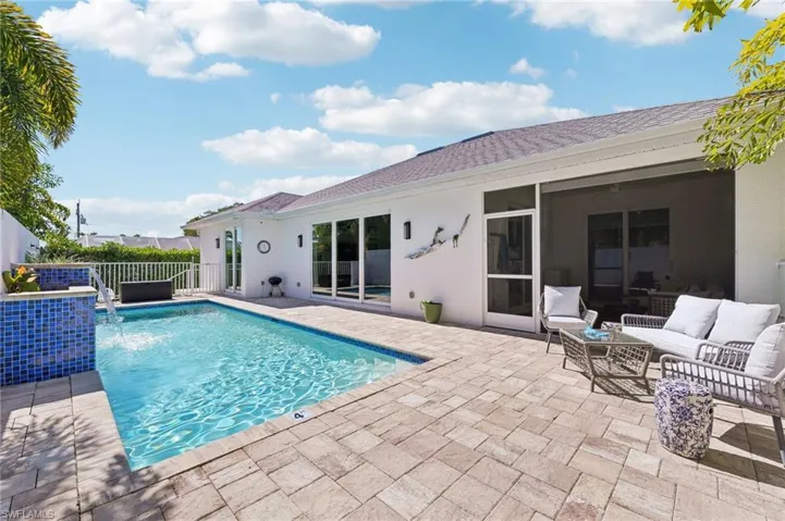 View of pool featuring outdoor lounge area and patio surround