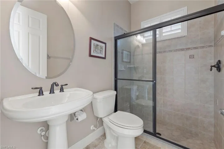 Pool bathroom with a walk-in shower