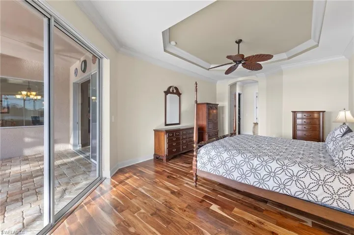 Primary bedroom with sliders to lanai