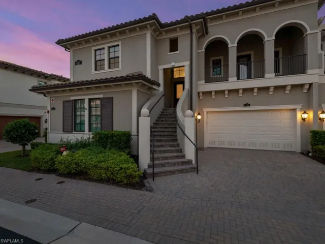 Mediterranean / spanish-style home with a 2 car garage