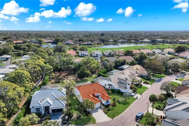 Aerial view of residential area with a large body of water