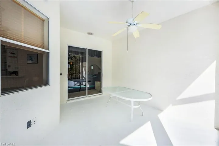 View of patio with ceiling fan