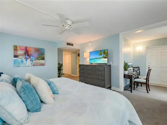 Bedroom featuring carpet floors and ceiling fan