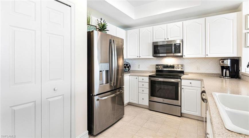 Spacious kitchen with stainless appliances