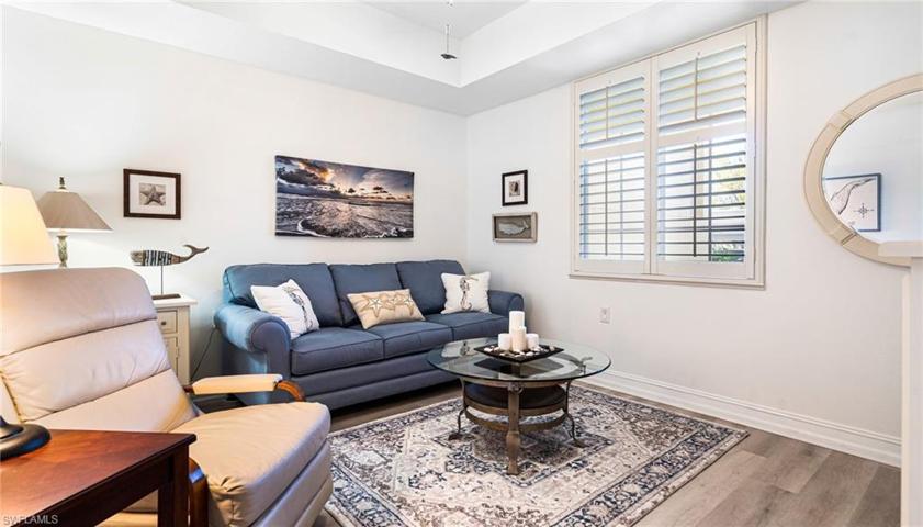 Third Bedroom or Flex Room with luxury vinyl floor s and plantation shutters