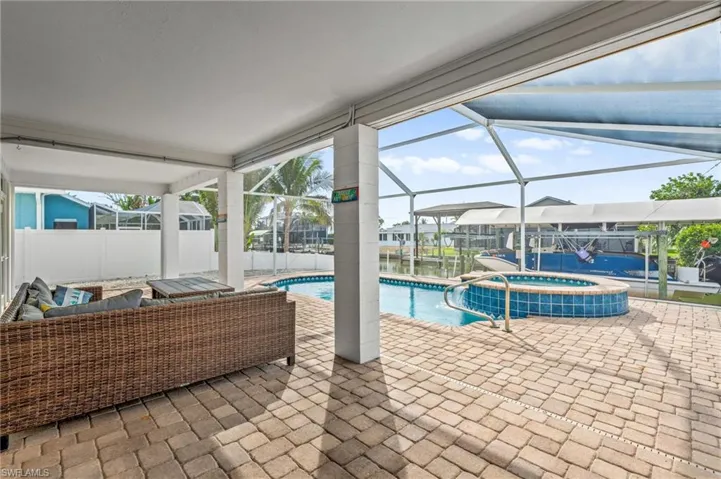 Screened in lanai, pool & lounge space -Virtually enhanced
