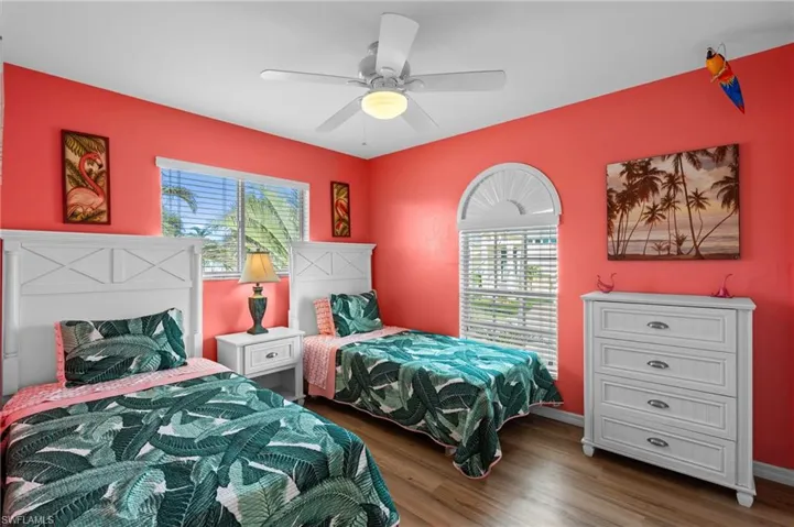 Guest bedroom with seaside charm -Virtually enhanced