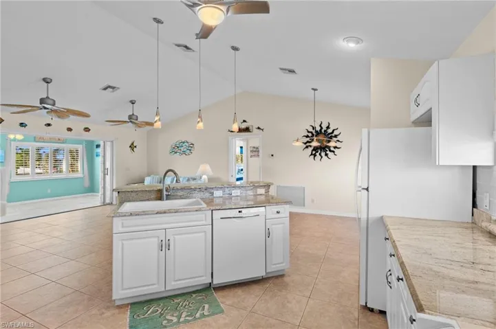 Kitchen flows seemlessly into living area -Virtually enhanced