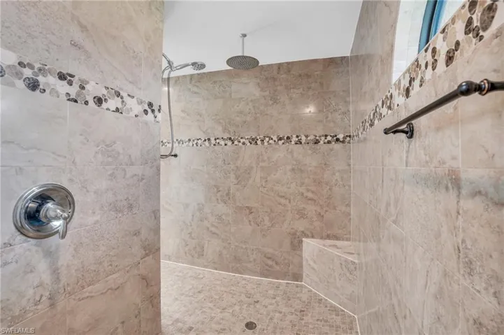 Bathroom with a tile shower