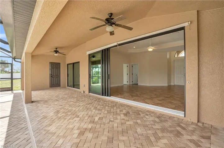 View of patio with ceiling fan