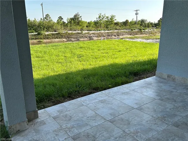 View of yard with a patio area
