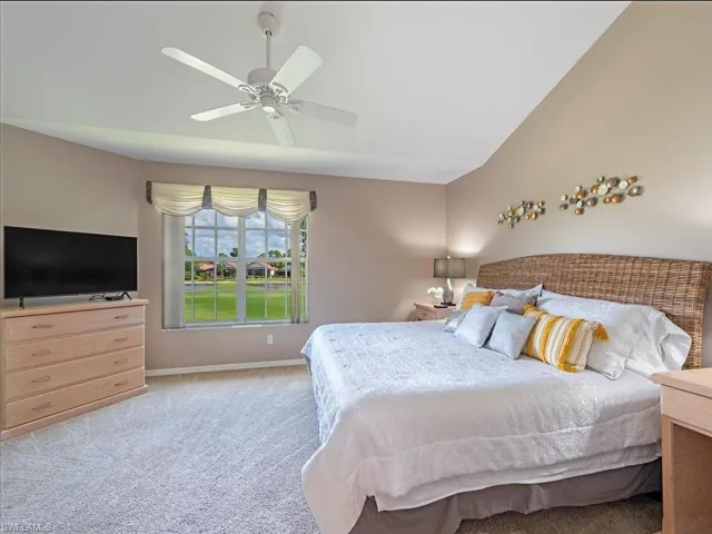 Spacious primary bedroom with access to the lanai and fabulous views