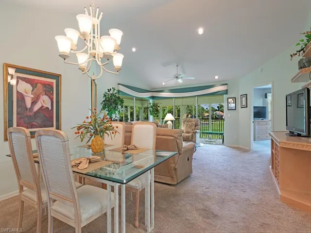 Spacious primary bedroom with access to the lanai and fabulous views