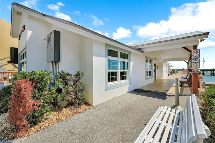 View of patio / terrace featuring central AC and fence