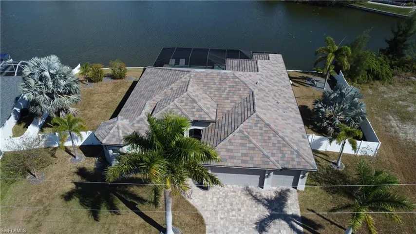 View of subject property featuring a large body of water