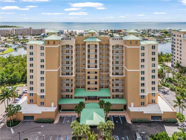 View of apartment building / complex with a water view