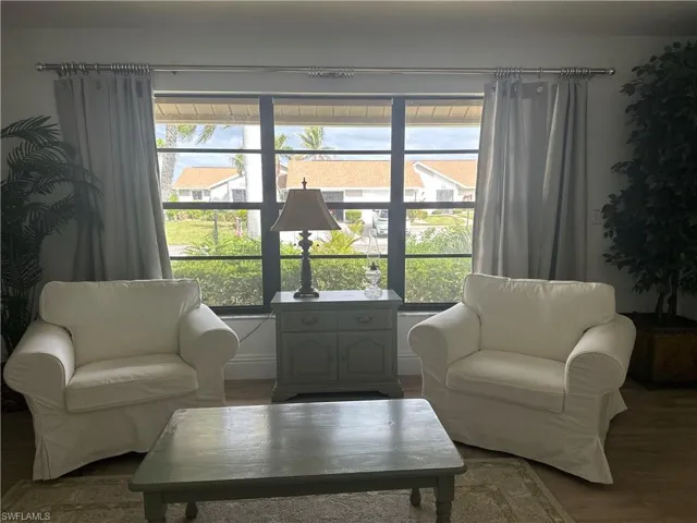 Living area featuring hardwood / wood-style floors and plenty of natural light