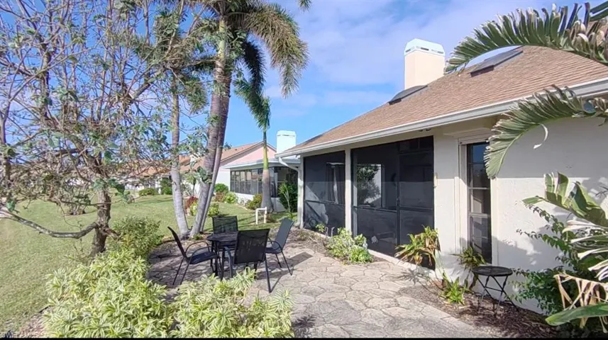 View of patio / terrace featuring a sunroom