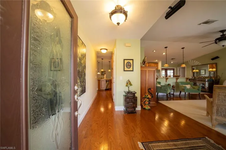 Entrance into home, noticd beautiful oak wood flooring