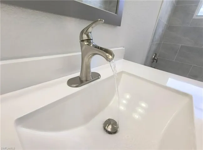 Details with a tub and sink