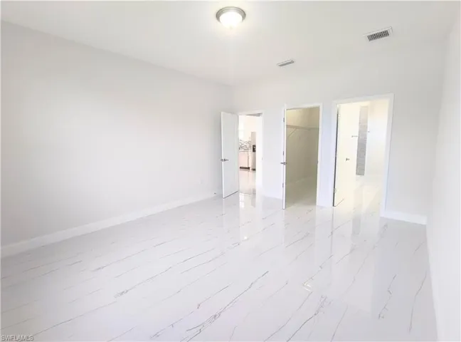 View of tiled empty room